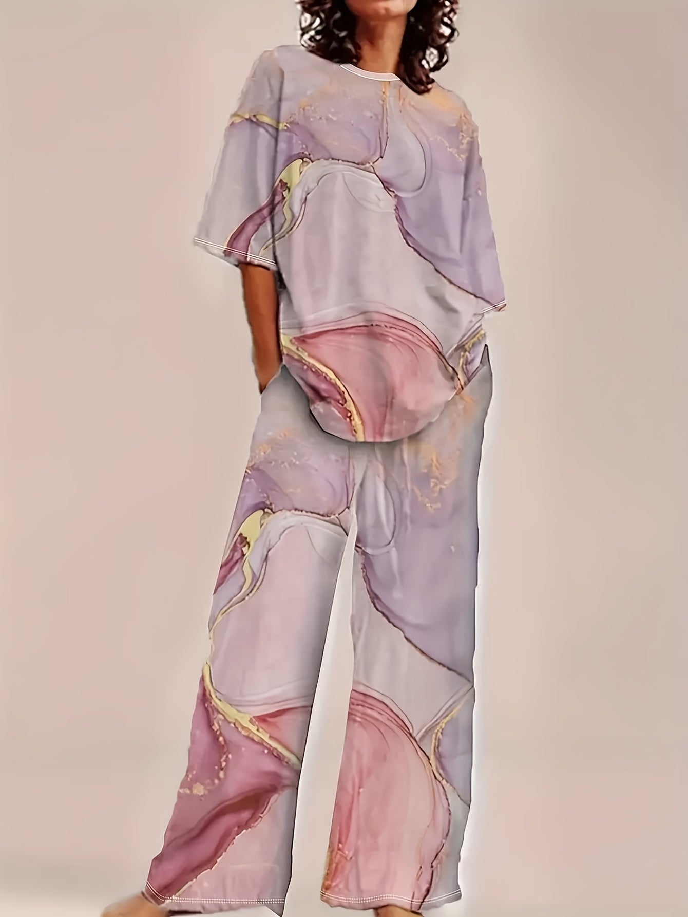 Wavy print round neck short sleeve top paired with straight leg loose pants two-piece set