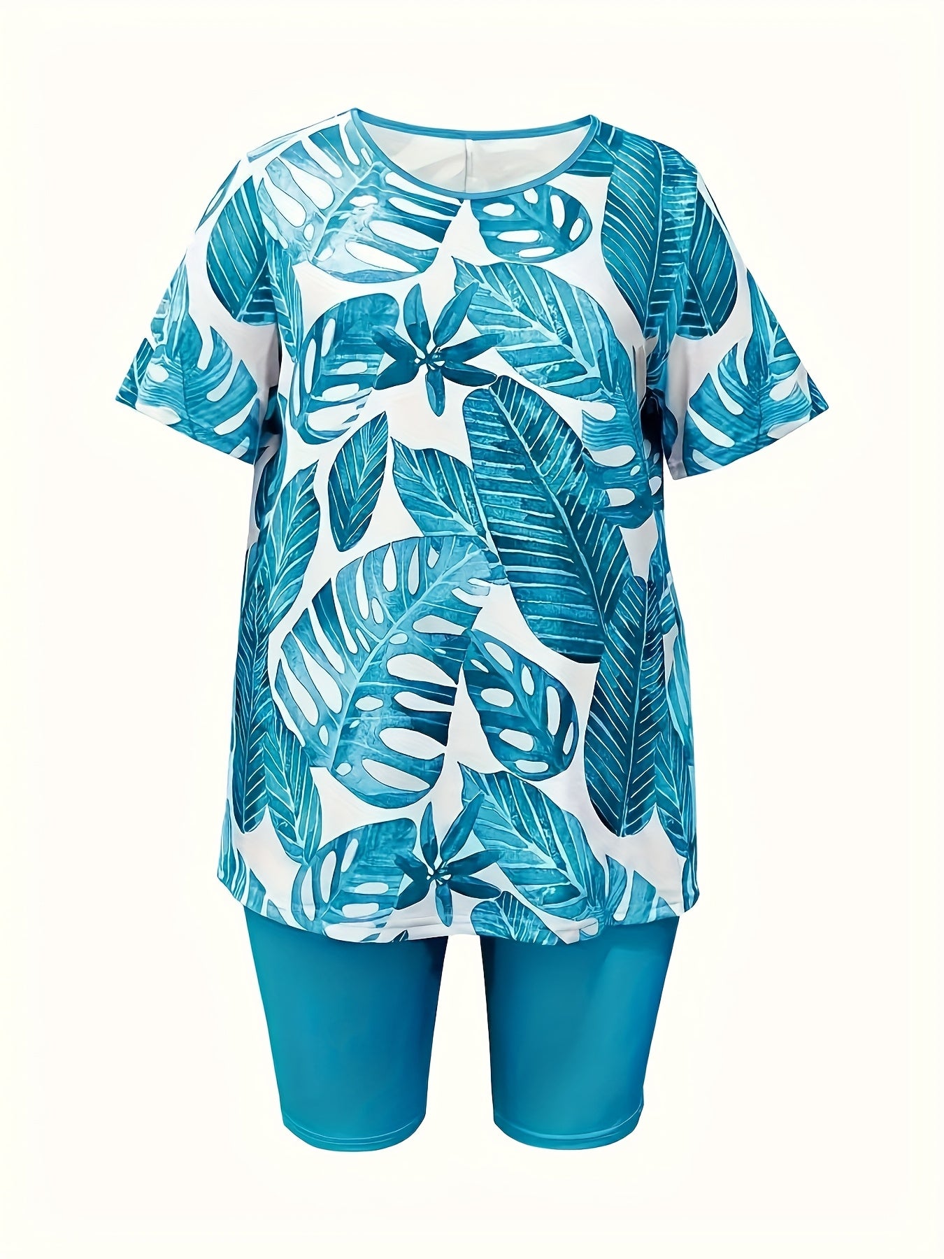 A Two-Piece Set Featuring a Printed Top with a Casual Round Neck And Short Sleeves, Paired with Shorts, Designed for Women.
